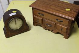 A SMALL INLAID EIGHT DAY MANTLE CLOCK TOGETHER WITH A JEWELLERY BOX IN THE FORM OF A CHEST OF