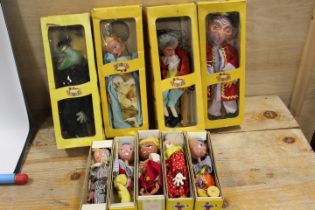 A COLLECTION OF NINE ASSORTED PELLUM BOXED PUPPETS