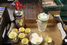 A VINTAGE DECO STYLE CHROME AND RED ENAMEL SODA SYPHON TOGETHER WITH A CROWN DEVON COFFEE SET