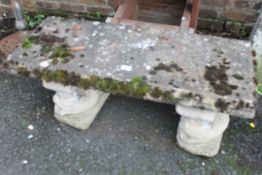 THREE PIECE CONCRETE BENCH STANDS ON FISHED CARVED FIGURES