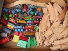 A SELECTION OF BRIO AND EARLY LEARNING CENTRE THOMAS THE TANK ENGINE LOCOMOTIVES AND TRACK
