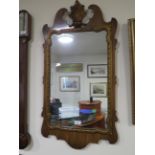 A GEORGIAN STYLE WALL MIRROR TOGETHER WITH A WALNUT AND GILT FRAMED EXAMPLE (2)