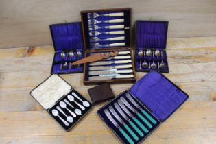 A QUANTITY OF CASED CUTLERY SETS ETC