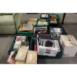 A LARGE QUANTITY OF ASSORTED BOOKS TO INCLUDE MANY HARDBACK MILITARY EXAMPLES (PLASTIC TRAYS NOT