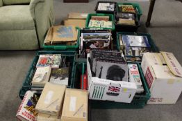 A LARGE QUANTITY OF ASSORTED BOOKS TO INCLUDE MANY HARDBACK MILITARY EXAMPLES (PLASTIC TRAYS NOT