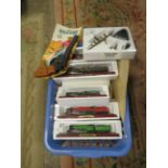 A BOX OF MIXED MODELS TO INCLUDE FIVE TRAINS ON WOODEN PLINTHS AND SIX BOXED ATLAS AEROPLANES TOGETH