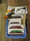 A BOX OF MIXED MODELS TO INCLUDE FIVE TRAINS ON WOODEN PLINTHS AND SIX BOXED ATLAS AEROPLANES TOGETH