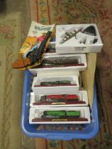 A BOX OF MIXED MODELS TO INCLUDE FIVE TRAINS ON WOODEN PLINTHS AND SIX BOXED ATLAS AEROPLANES TOGETH