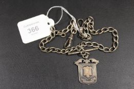 A HALLMARKED SILVER WATCH CHAIN WITH T-BAR AND HALLMARKED SILVER MEDALLION FOB - APPROX WEIGHT 51.