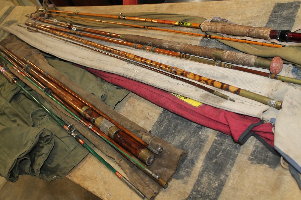 A SELECTION OF FISHING RODS ETC
