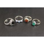 A COLLECTION OF 4 SILVER GEMSTONE DRESS RINGS TO INCLUDE AMETHYST, OPAL, ETC