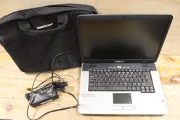 A MEDION MULTI MEDIA NOTEBOOK MD96290 WITH POWER CABLE & CARRY CASE
