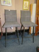 A PAIR OF MODERN UPHOLSTERED KITCHEN STOOLS
