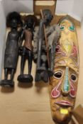 A WEST AFRICAN NIGERIAN TRIBAL ART MASK TOGETHER WITH TRIBAL ART CARVED FIGURES