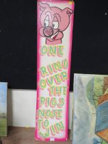 A VINTAGE CARD ADVERTISING SIGN 'ONE RING OVER THE PIGS NOSE TO WIN' 122 X 30 CM