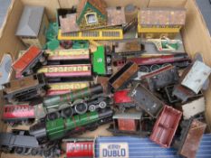 A SELECTION OF HORNBY DUPLO LOCOMOTIVES, CARRIAGES, WAGONS, BUILDINGS AND ROLLING STOCK