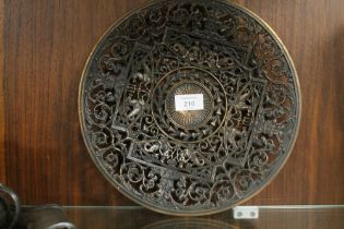 A DECORATIVE PIERCED METAL PLATE STAMPED ON REVERSE COALBROOKDALE (CRACK TO RIM)