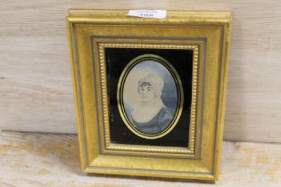 A MINIATURE PORTRAIT OF A LADY IN A WHITE BONNET, IN A MODERN GILT FRAME