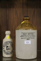 A WHITE BROS METALICAL BREWER CHAPEL STREET WOLVERHAMPTON STONE WARE BOTTLE DATED 1958 TOGETHER WITH