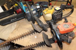 TWO PETROL CHAINSAWS AND TWO PETROL HEDGE TRIMMERS