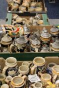 FOUR TRAYS OF CERAMICS BEER STEINS AND TANKERS