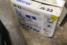 A BOXED BROTHER JS'23 SEWING MACHINE (NOT TESTED )
