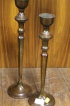 TWO BRONZE EFFECT METAL CANDLESTICKS