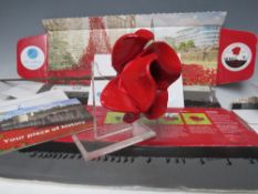 A LIMITED EDITION TOWER OF LONDON "BLOOD SWEPT LANDS AND SEAS OF RED" CERAMIC POPPY BY PAUL CUMMINS