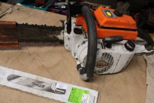 A PETROL STIHL CHAINSAW