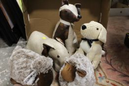 A BOX OF ANIMAL FIGURE DOOR STOPS