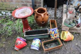A SELECTION OF CERAMIC AND TERRACOTTA PLANTERS TOGETHER WITH A CERAMIC BIRD BATH AND STRAWBERRY