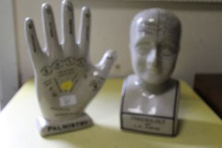 A PHRENOLOGY HEAD AND A PALMISTRY HAND FIGURES