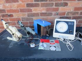 A SELECTION OF SCIENTIFIC AND OPTICAL INSTRUMENTS TO INCLUDE TWO FOCI METERS, A QUARTZ DRIVE