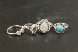 A COLLECTION OF FOUR 925 SILVER GEMSTONE DRESS RINGS TO INC AMETHYST, TURQUOISE , OPAL ETC