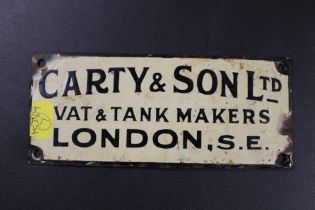 A SMALL ENAMELLED METAL CUP - CARTY & SON LTD