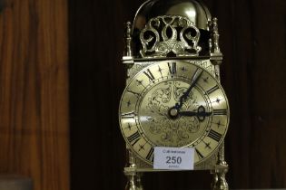 A SMITHS BRASS MANTLE CLOCK WITH QUARTZ MOVEMENT