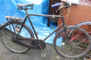 A VINTAGE BICYCLE TOGETHER WITH A COLLECTION OF SPARES