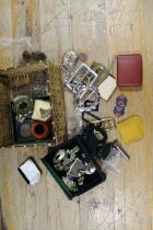 A BASKET OF COLLECTABLE TO INCLUDE A ENAMEL CLIPS, BELT BUCKLES HALLMARKED SILVER ETC