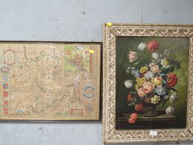 A FRAMED OIL ON BOARD STILL LIFE OF FLOWERS TOGETHER WITH A FRAMED AND GLAZED MAP OF STAFFORDSHIRE
