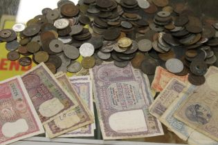 A BOX OF COLLECTORS COINS AND BANKNOTES