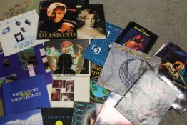 A TRAY OF ASSORTED TOUR PROGRAMMES TO INCLUDE QUEEN, MOODY BLUES, NEIL DIAMOND ETC