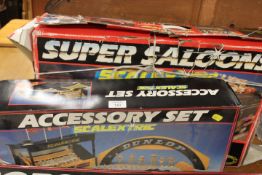 A BOXED SCALEXTRIC SUPER SALOONS TOGETHER WITH A BOXED ACCESSORIES SET BOTH UNCHECKED