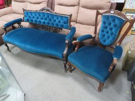 AN EDWARDIAN MAHOGANY UPHOLSTERED ARM CHAIR AND SETTEE