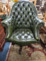 A QUALITY GREEN LEATHER LARGE TUB STYLE SWIVEL OFFICE CHAIR
