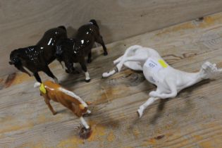 A BESWICK HORSE AND A ROYAL DOULTON HORSE TOGETHER WITH TWO OTHERS A/F
