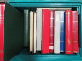 A TRAY OF EMPTY STAMP ALBUMS