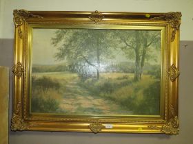 A LARGE GILT FRAMED PRINT