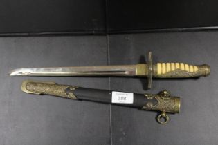 A REPRODUCTION MILITARY DAGGER