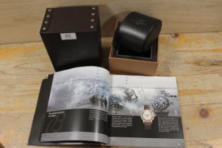 A BREITLING WATCH BOX TOGETHER WITH AN ASSOCIATED CATALOGUE