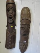TWO LARGE AFRICAN STYLE WOODEN WALL MASKS